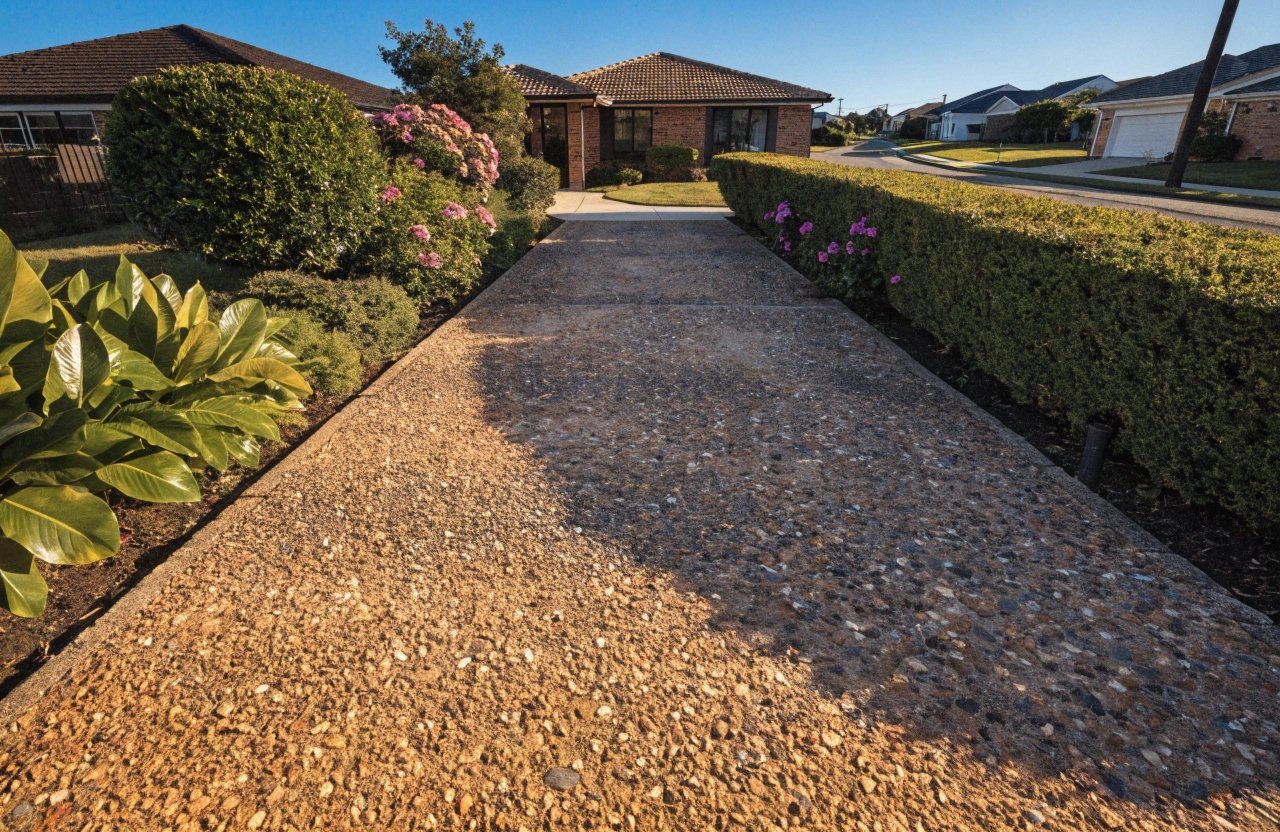 Exposed aggregate concrete driveway installation in Elanora, Gold Coast